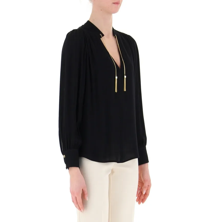 Blusa scollo V