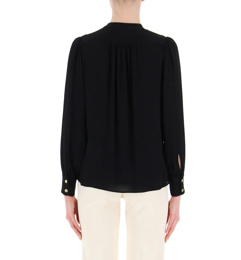 Blusa scollo V