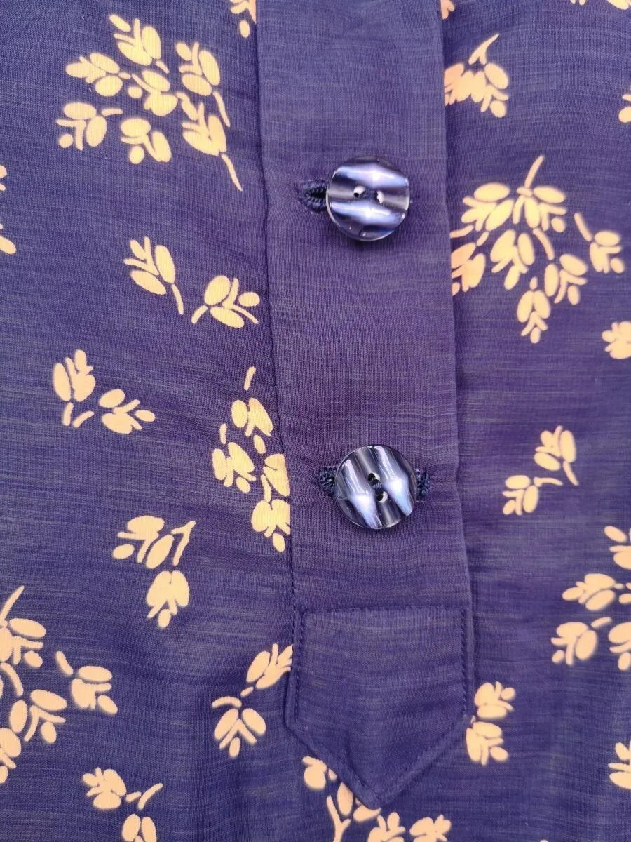 Camicia a polo in seta blu fiori gialli