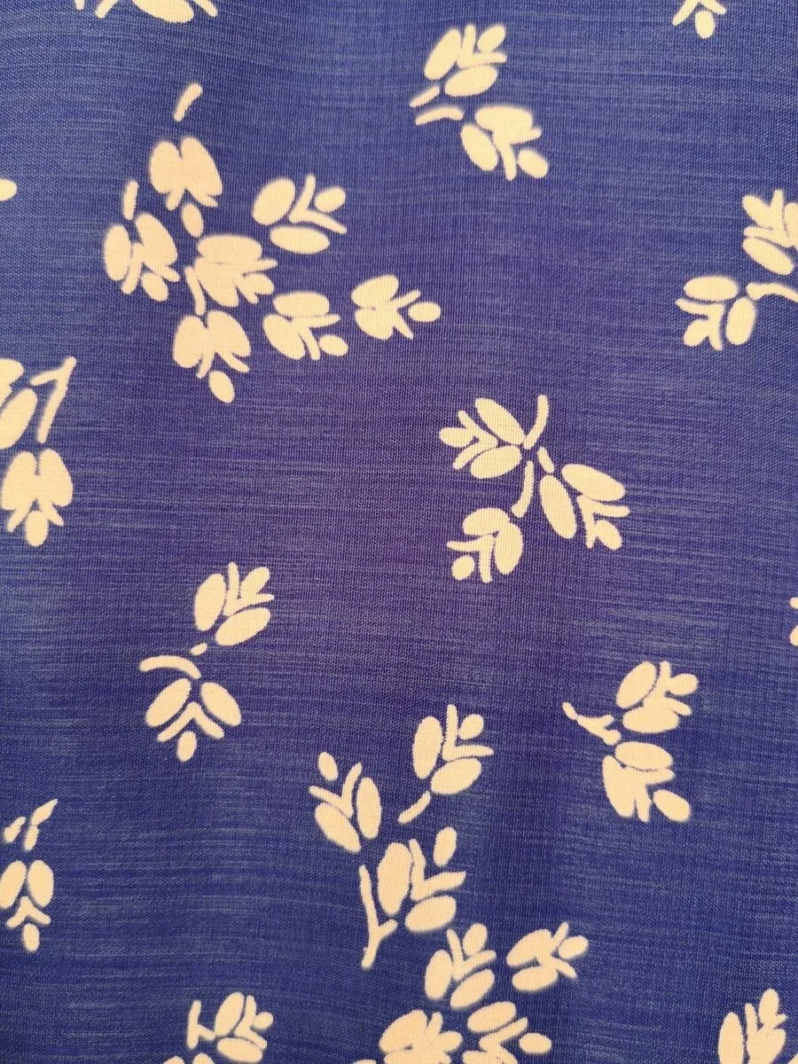 Camicia a polo in seta blu fiori gialli