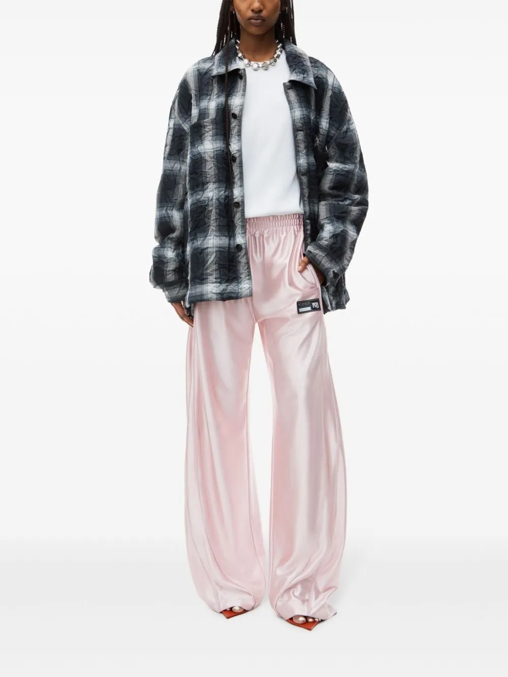 Pantaloni con finitura satinata in rosa Alexander Wang - donna