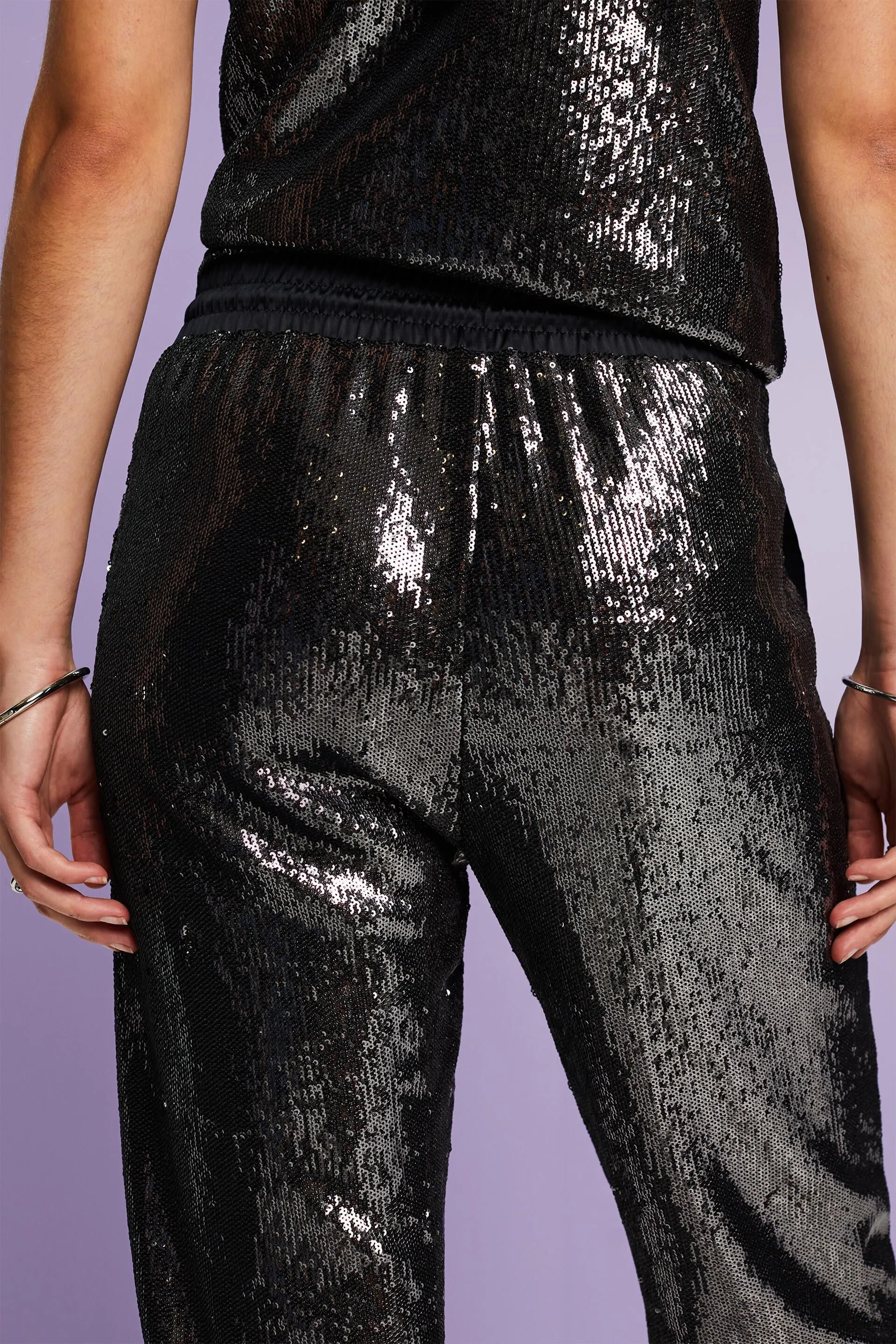 Pantaloni in raso con paillettes