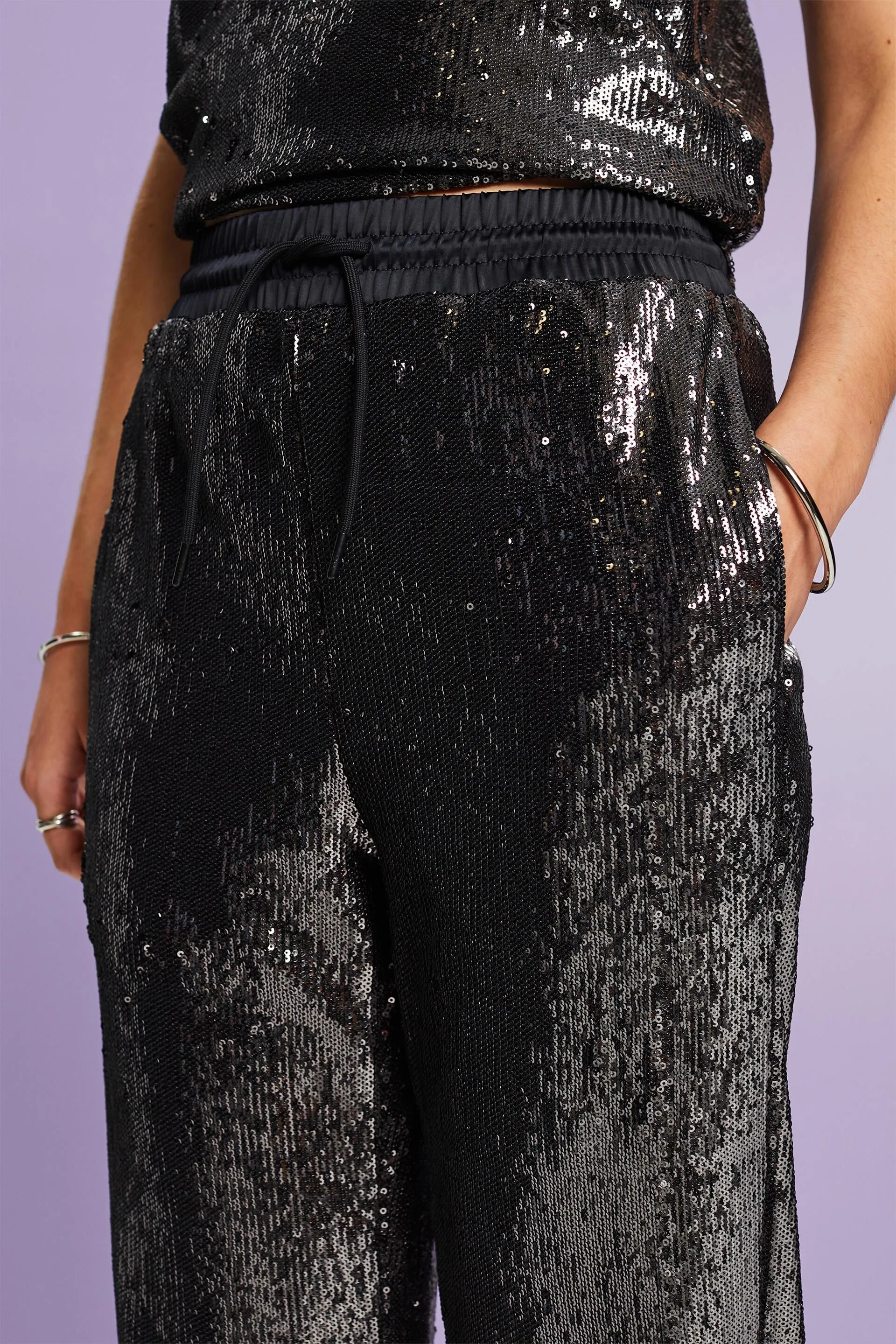 Pantaloni in raso con paillettes
